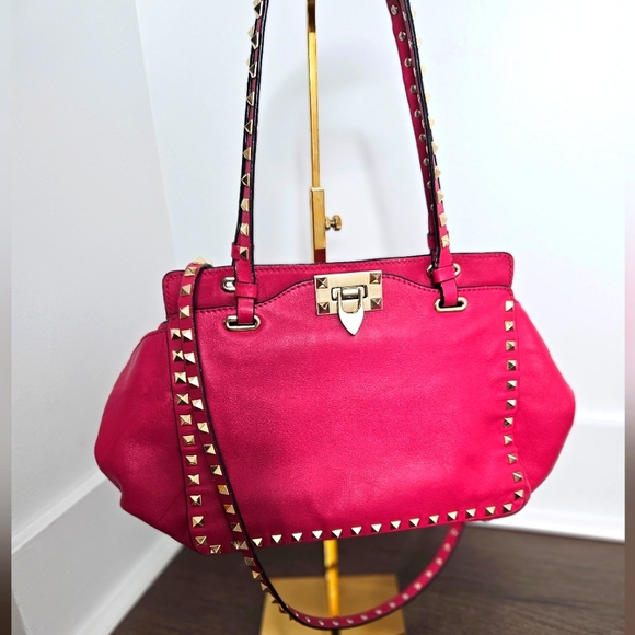 Valentino Garavani Handbags - BAG GAME ITEM! Valentino Dark Pink Leather Rockstud Trapeze Tote Bag 💖